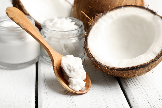 coconut oil in a wooden spoon